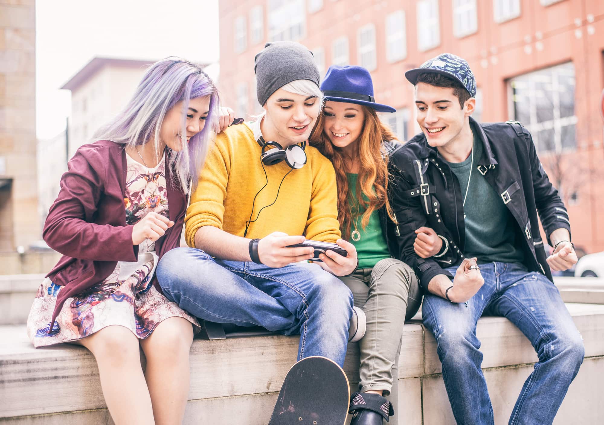 Teenagers meeting outdoors